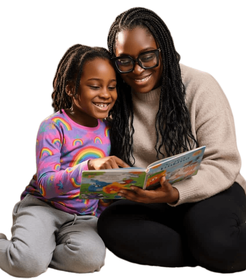 Caregiver and child reading together – JAI Network